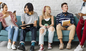 A group of students sitting on a couch